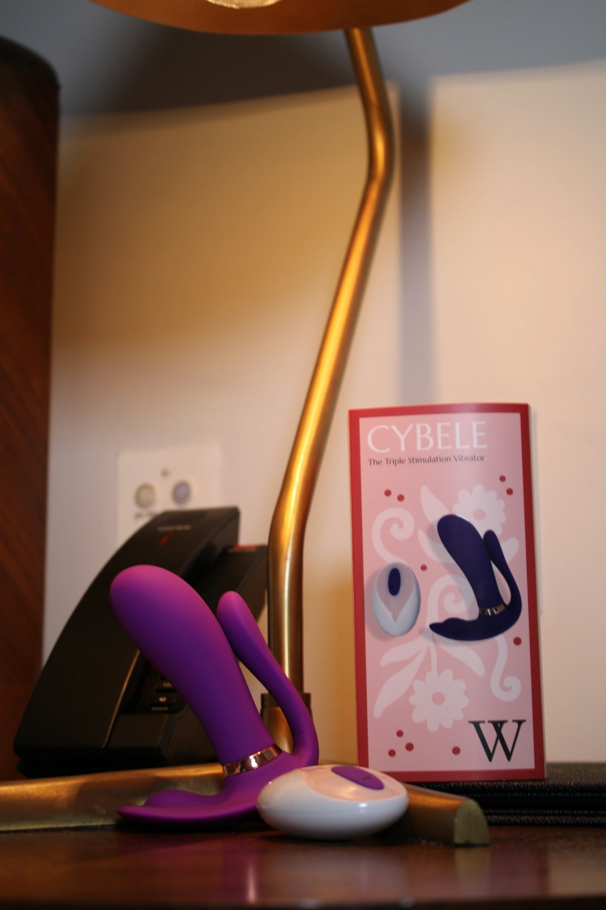 a desk lamp with a pair of scissors next to it