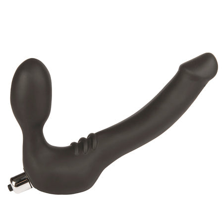 Black plastic dildo on a white background.
