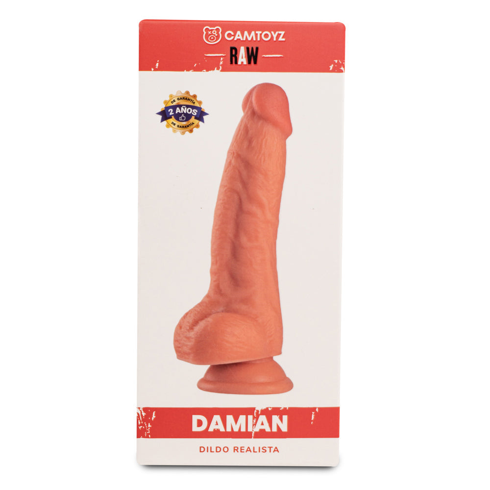 Product packaging of a realistic dildo with 'Camtoyz' branding on a white background
