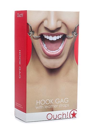 The Ouch Hook Gag with Leather Straps O/S box shows a close-up of a smiling mouth held open by metal hooks attached to adjustable leather straps, with the Ouch! brand name on the packaging.