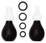 The Ouch Nipple Erector Set includes two bulb-shaped black and clear silicone suction devices, displayed upright, with four black nipple rings in varying sizes between them—perfect for versatile nipple stimulation.